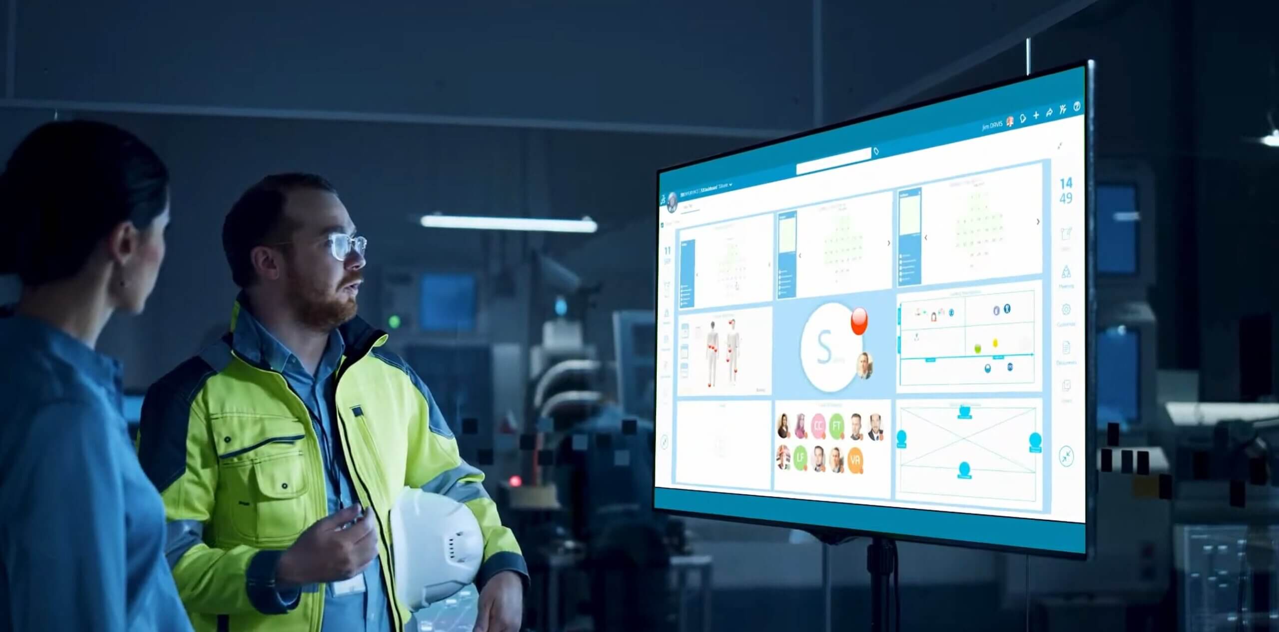 Two people looking at a computer screen