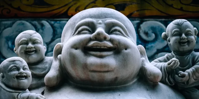 Laughing Buddha sculptures