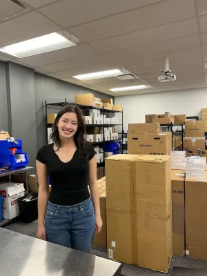 intern standing in fulfillment room